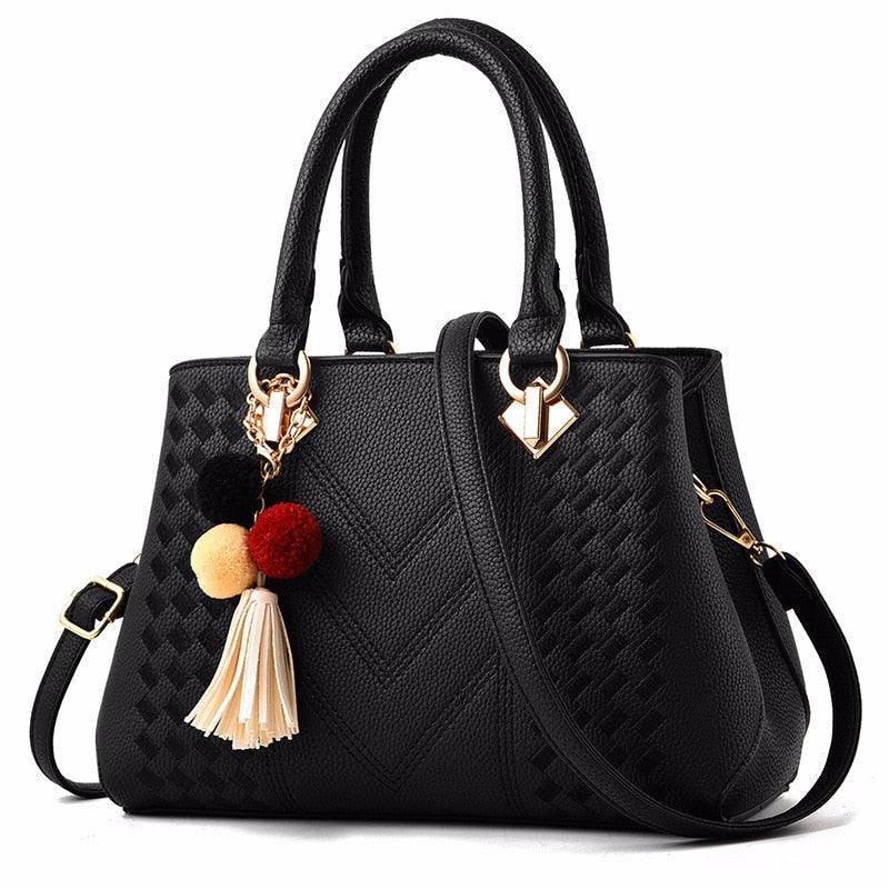 Bolsa Feminina de Ombro em Couro com Tassel